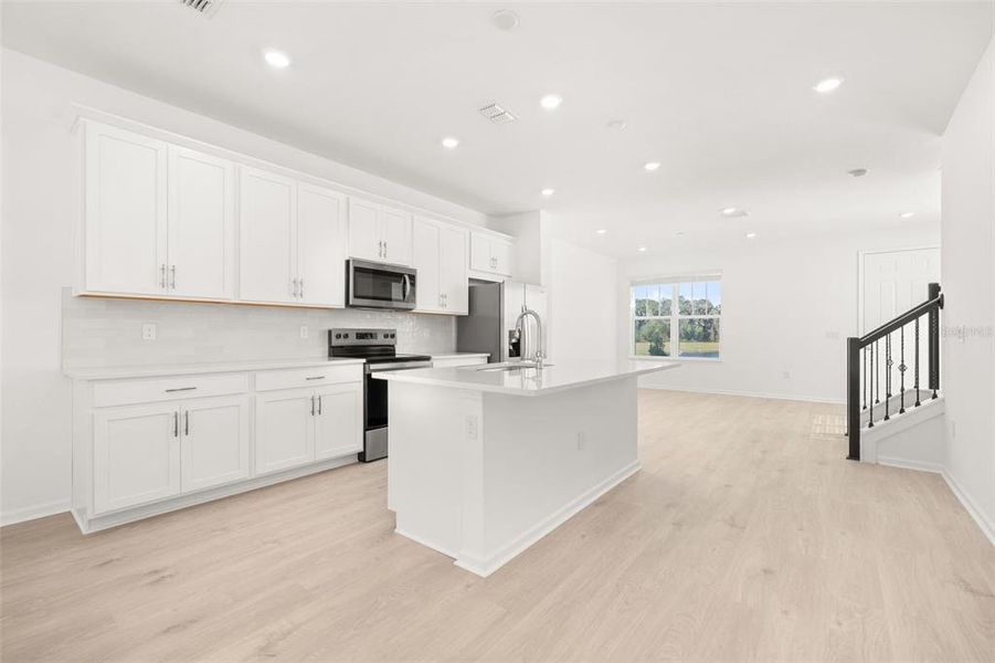 Furnished interior view inside a new home in Serenade at Ovation, Winter Garden (Image 6). Furnished interior view inside a new home in Serenade at Ovation, Winter Garden (Image 6).