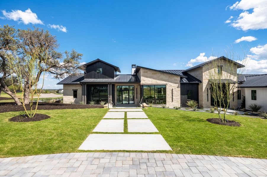 Front exterior of a new home in , Austin, TX, highlighting curb appeal (Image 22). Front exterior of a new home in , Austin, TX, highlighting curb appeal (Image 22).