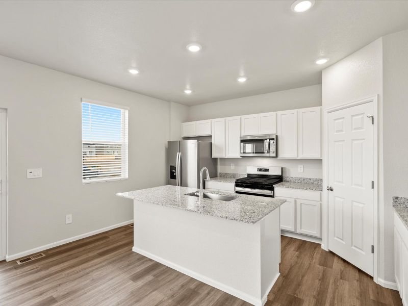 Furnished interior view inside a new home in Lorson Ranch : The Springs Collection, Colorado Springs (Image 5). Furnished interior view inside a new home in Lorson Ranch : The Springs Collection, Colorado Springs (Image 5).