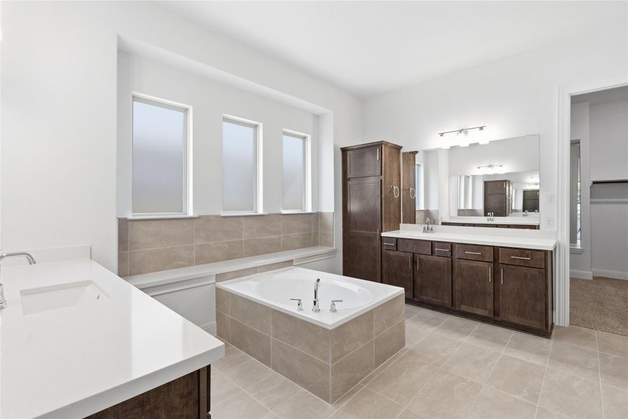 Furnished interior view inside a new home in Oaks at San Gabriel, Georgetown (Image 10).