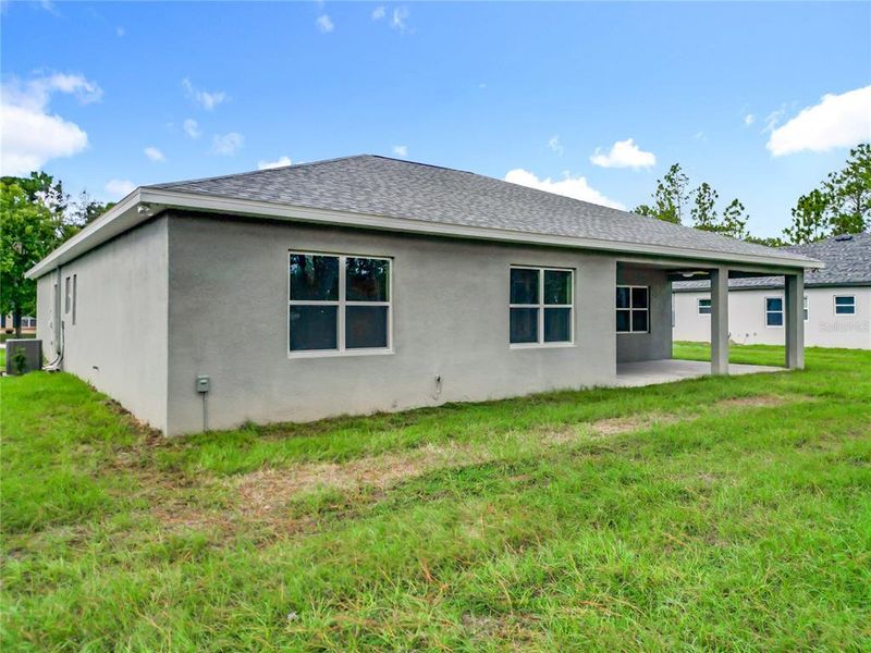 Exterior details and patio area of a home in , Brooksville (Image 23).