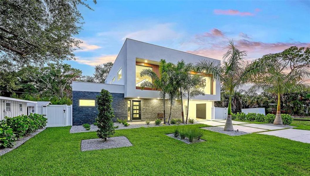 Front exterior of a new home in , Sarasota, FL, highlighting curb appeal (Image 22).