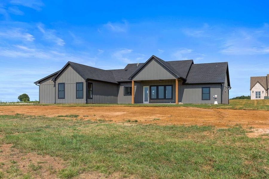Front exterior of a new home in , Whitesboro, TX, highlighting curb appeal (Image 22). Front exterior of a new home in , Whitesboro, TX, highlighting curb appeal (Image 22).