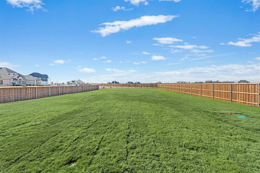 Exterior details and patio area of a home in Settlers Glen, New Fairview (Image 23).