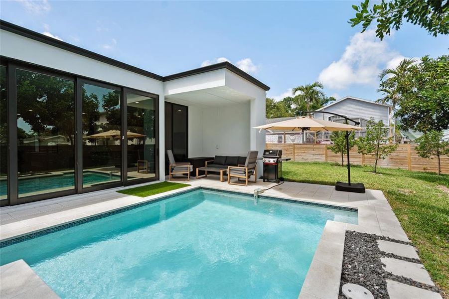 Exterior details and patio area of a home in , Sarasota (Image 24).