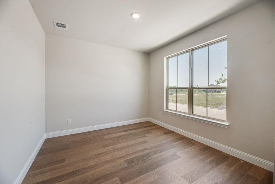 Spacious, unfurnished interior of a new home in Bayside, Rowlett (Image 37).