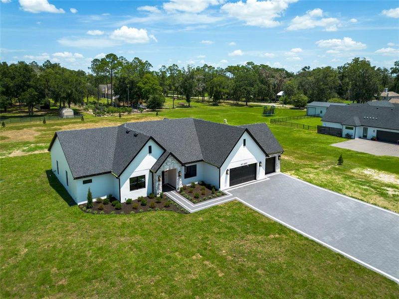 Front exterior of a new home in , Dade City, FL, highlighting curb appeal (Image 27).