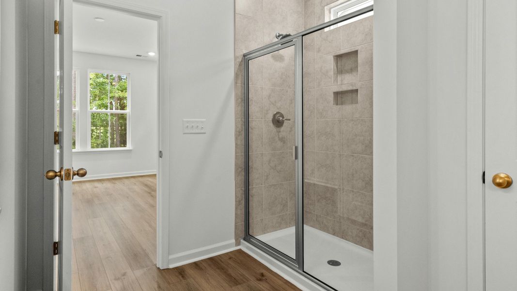 Furnished interior view inside a new home in Bluffs at Sun Colony, Longs (Image 18).