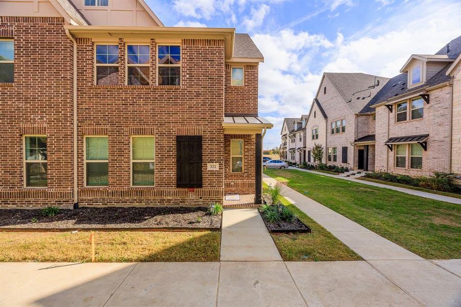 Move in ready newly constructed end unit townhouse - Front View