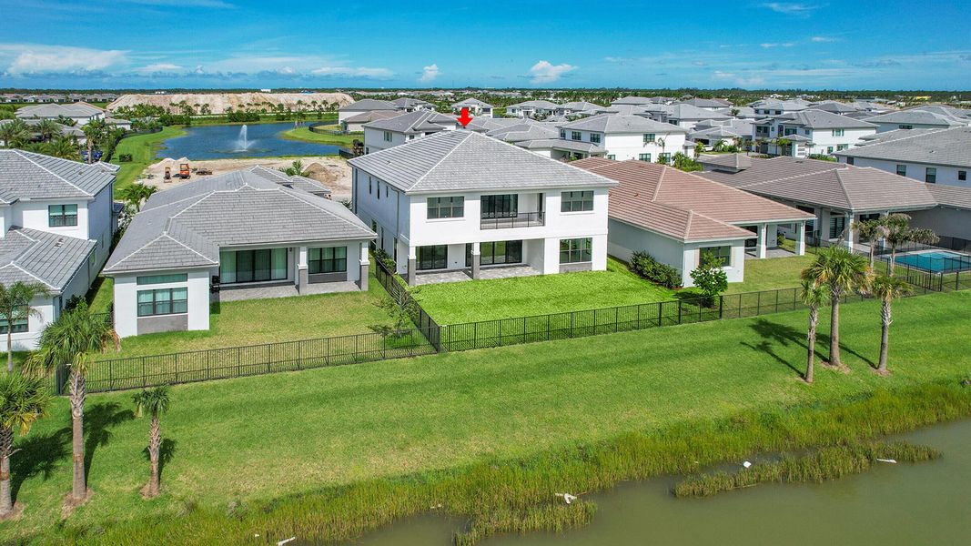 Front exterior of a new home in Apex at Avenir, Palm Beach Gardens, FL, highlighting curb appeal (Image 24).
