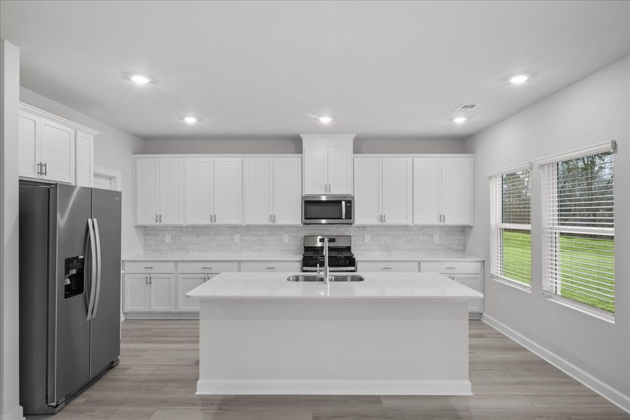 Furnished interior view inside a new home in The Farm at Wells Creek - Signature Collection, Gray Court (Image 5).