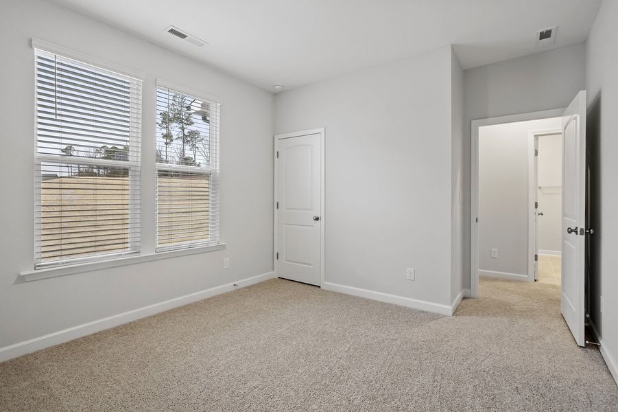 Spacious, unfurnished interior of a new home in Ovation at Sweetbrier, Durham (Image 24).