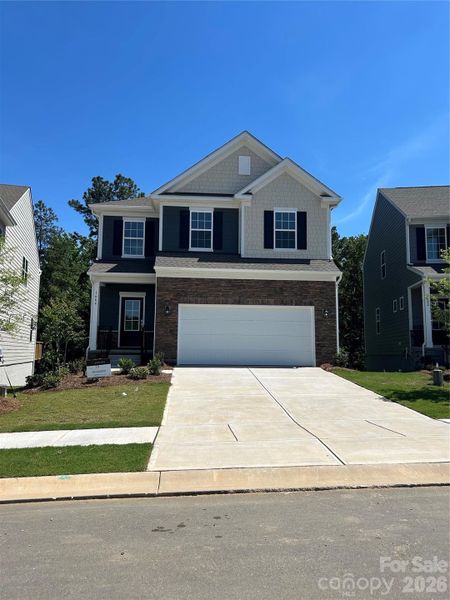 Front exterior of a new home in Redhawk, Belmont, NC, highlighting curb appeal (Image 2).