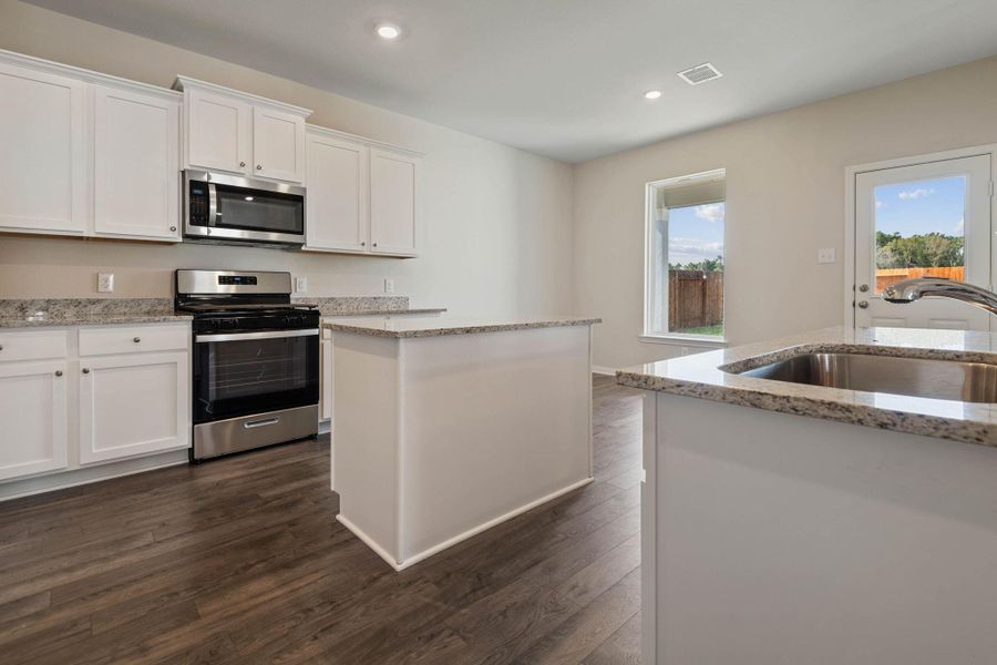 Furnished interior view inside a new home in Sweetwater Ridge, Conroe (Image 9).