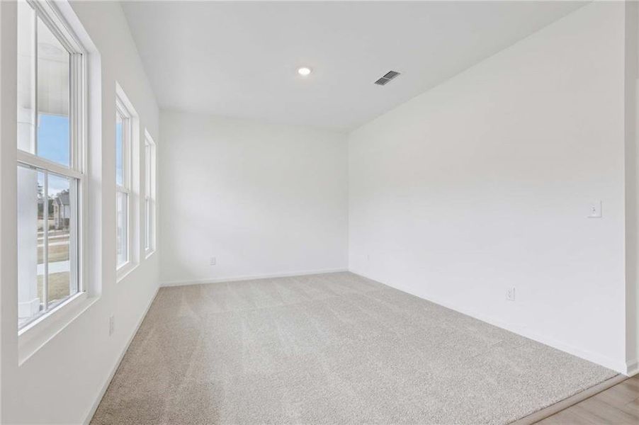 Spacious, unfurnished interior of a new home in The Pointe at Heron Bay, Locust Grove (Image 19).