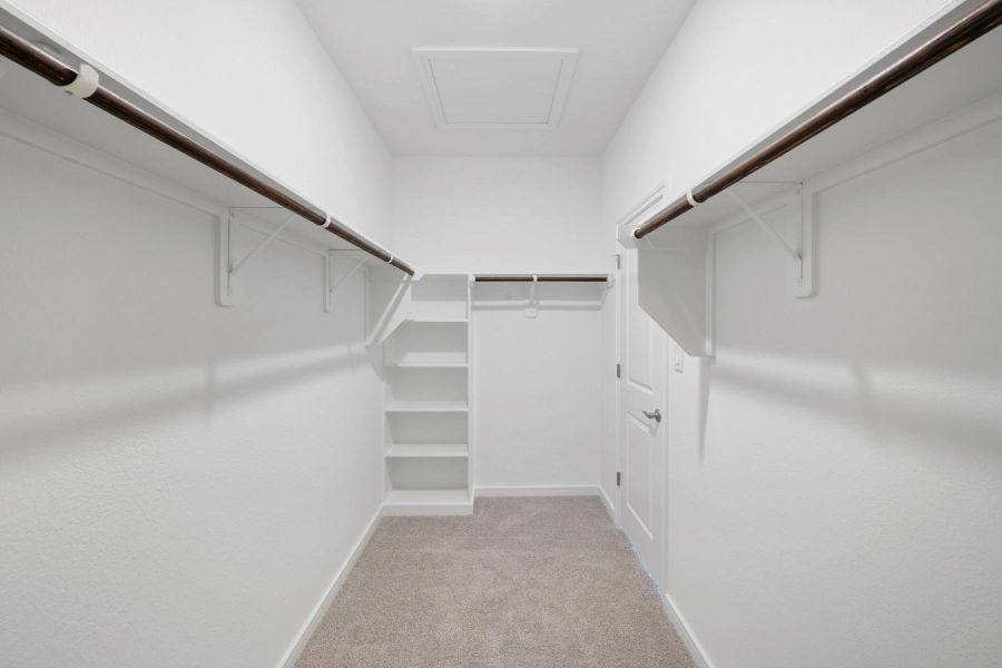 Primary walk-in closet (*Photo not of actual home and used for illustration purposes only.)