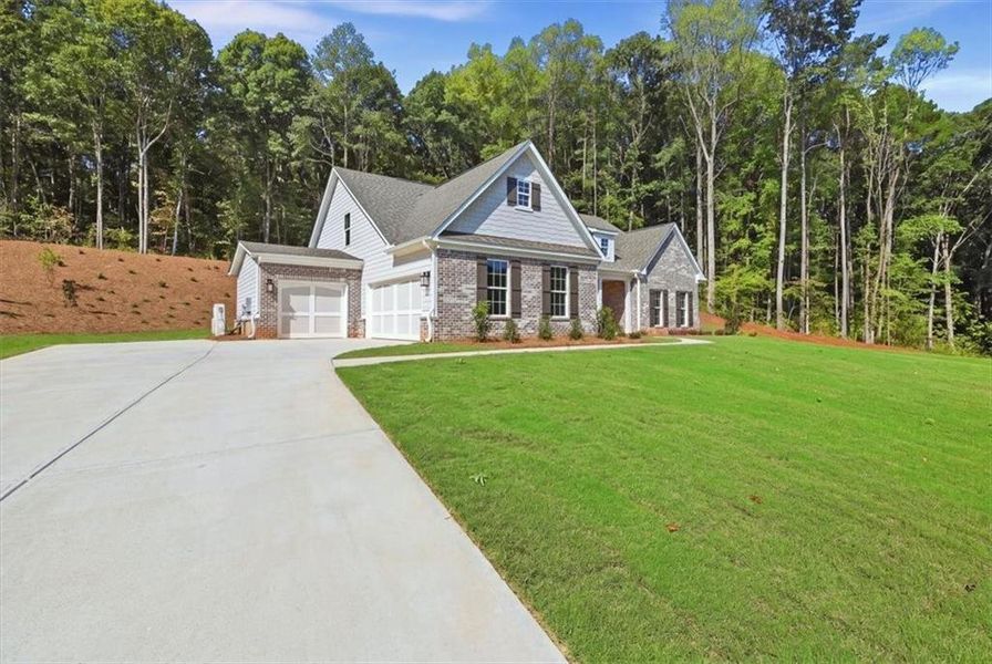 Front exterior of a new home in Bradley Gin, Monroe, GA, highlighting curb appeal (Image 28).