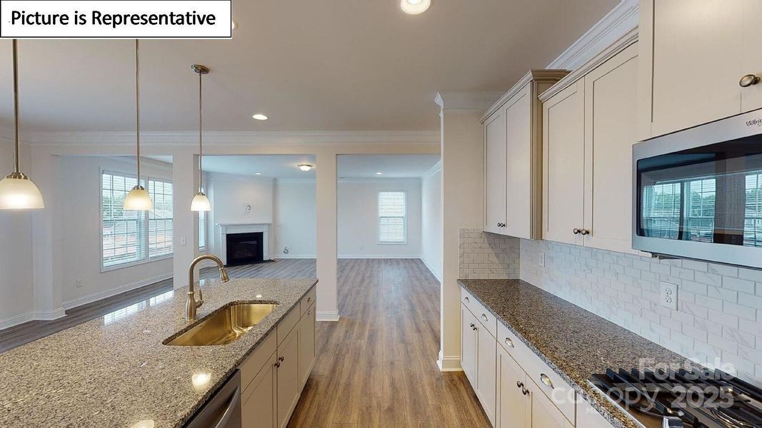 Furnished interior view inside a new home in Sylvan Creek, Denver (Image 3).