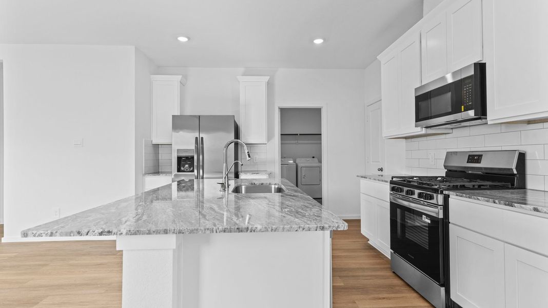 Representative furnished interior of a home built from the Florence by D.R. Horton in Riverwood Ranch, Angleton (Image 5). Representative furnished interior of a home built from the Florence by D.R. Horton in Riverwood Ranch, Angleton (Image 5).