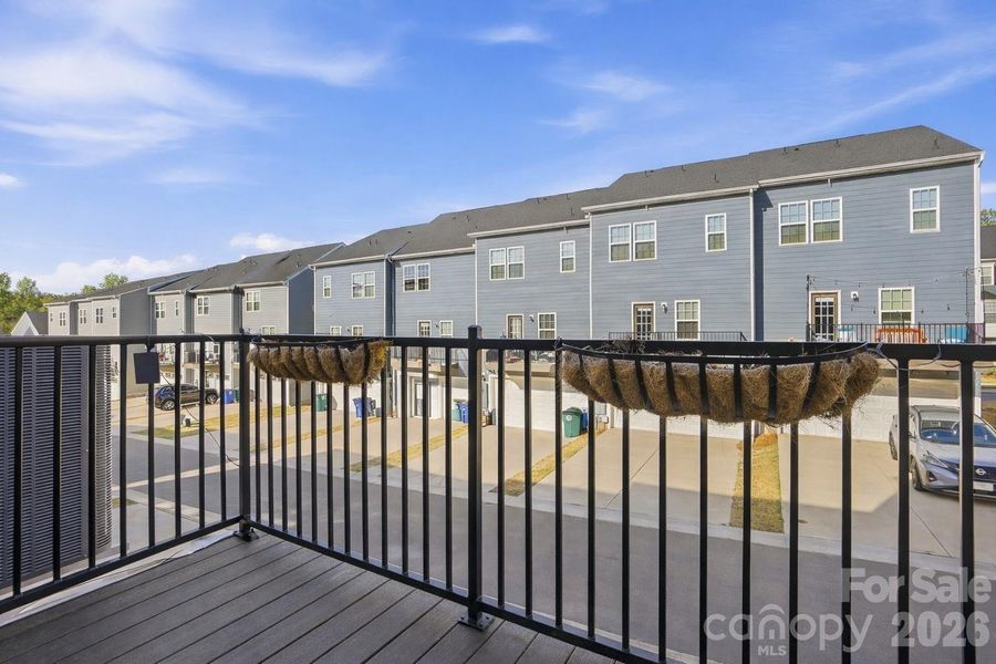Exterior details and patio area of a home in Stone Creek Townhomes, Matthews (Image 21).