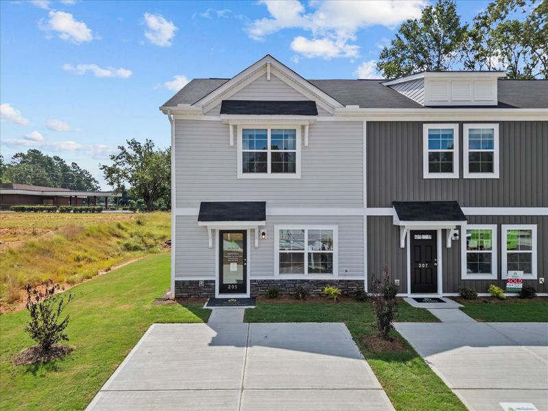 Representative exterior photo of a completed home built from the Aspen by McGuinn Homes in Harbison Grove, Columbia, SC (Image 27). Representative exterior photo of a completed home built from the Aspen by McGuinn Homes in Harbison Grove, Columbia, SC (Image 27).