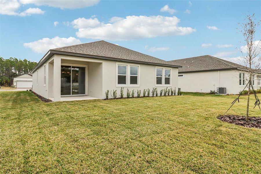 Exterior details and patio area of a home in Legends Preserve - Signature Series, Daytona Beach (Image 19).