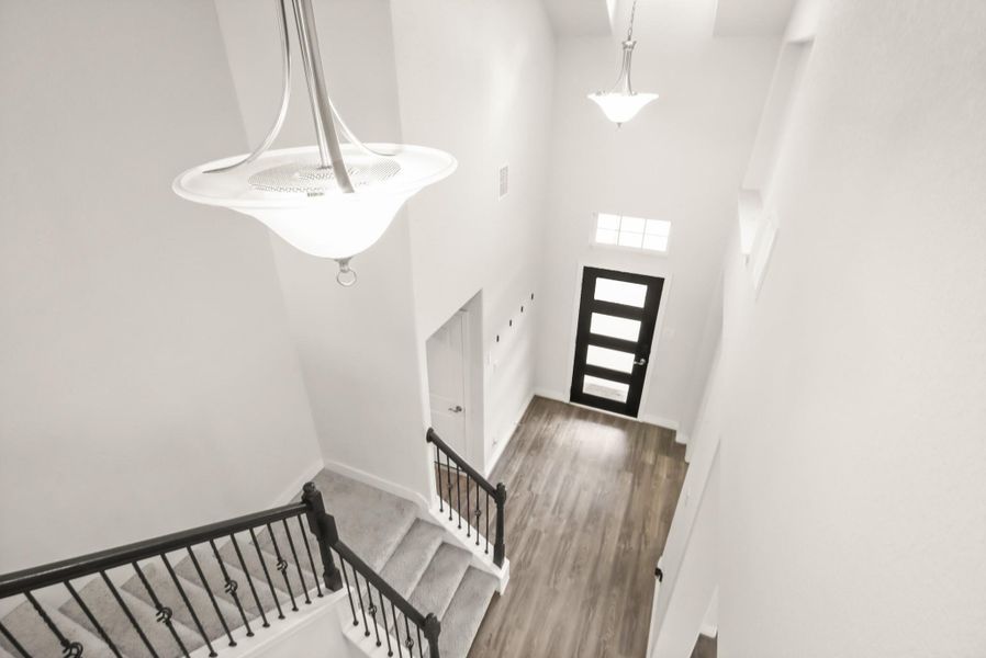 A truly "wow'ing" entry way, two-stories high creates a dramatic and grand entrance