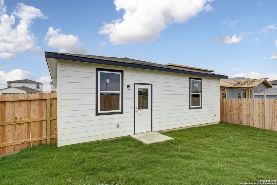 Front exterior of a new home in Applewhite Meadows, San Antonio, TX, highlighting curb appeal (Image 10).