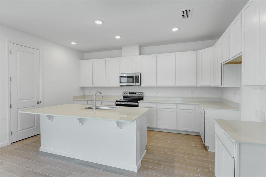Furnished interior view inside a new home in Seasons at Grandview Gardens, Deland (Image 5).