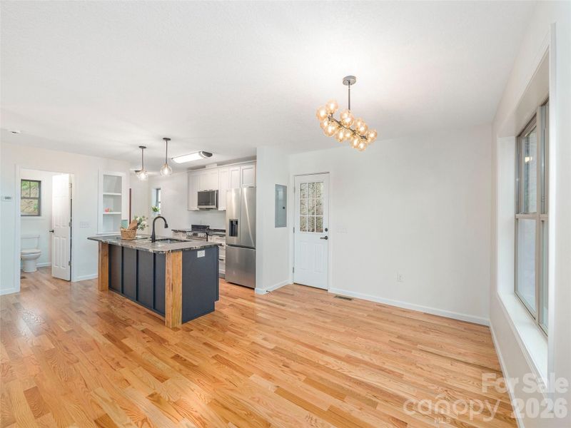 Furnished interior view inside a new home in , Waynesville (Image 8).