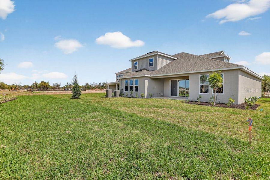 Exterior details and patio area of a home in Firethorn, Parrish (Image 4).