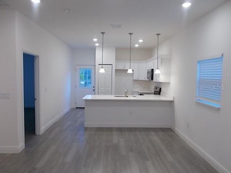 Furnished interior view inside a new home in , Daytona Beach (Image 6).
