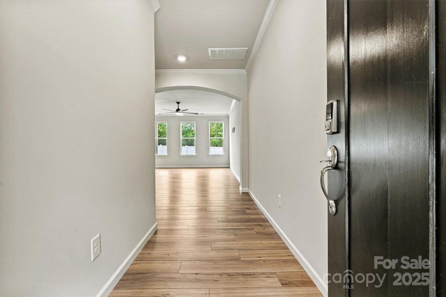 Step through the inviting entryway and discover a dedicated office to your left, while the open-concept great room unfolds straight ahead—perfect for both productivity and relaxation. Step through the inviting entryway and discover a dedicated office to your left, while the open-concept great room unfolds straight ahead—perfect for both productivity and relaxation.