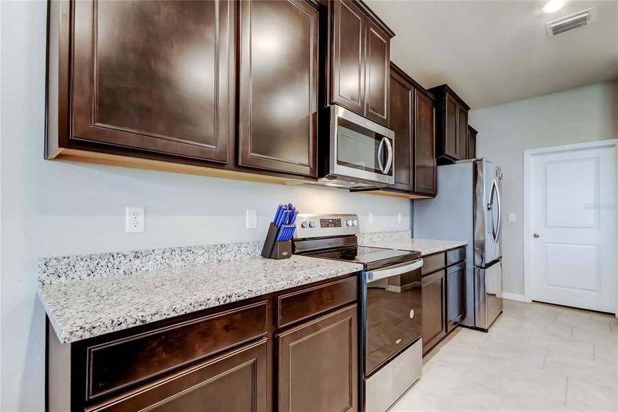 Furnished interior view inside a new home in , Wesley Chapel (Image 36).
