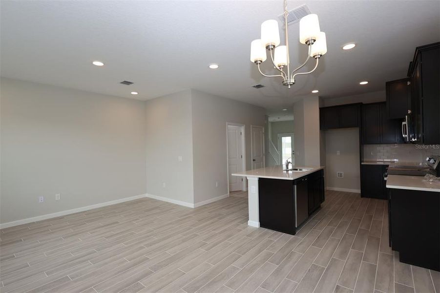 Spacious, unfurnished interior of a new home in Tribute at Ovation, Winter Garden (Image 31).