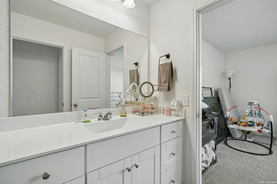 Furnished interior view inside a new home in Hennersby Hollow, San Antonio (Image 40).