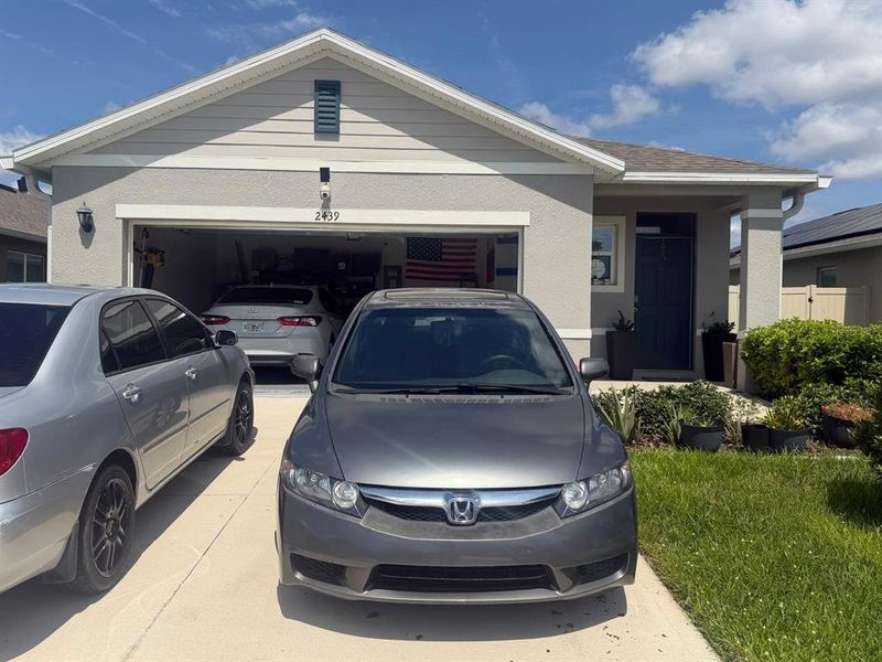 Front exterior of a new home in Concorde, Sanford, FL, highlighting curb appeal (Image 1). Front exterior of a new home in Concorde, Sanford, FL, highlighting curb appeal (Image 1).