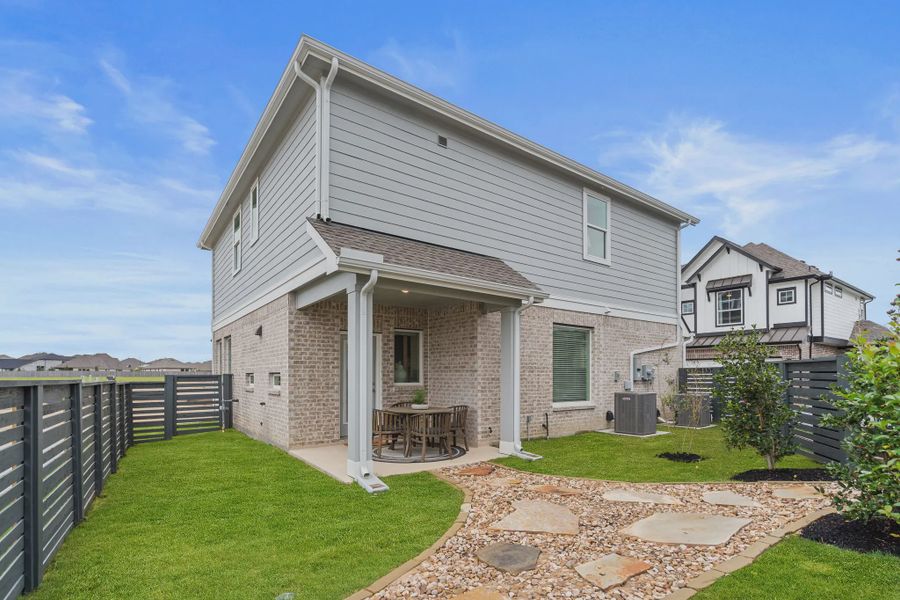 Representative exterior details of a home built from the Riverdale by Chesmar Homes in Bridgeland, Elgin (Image 4).