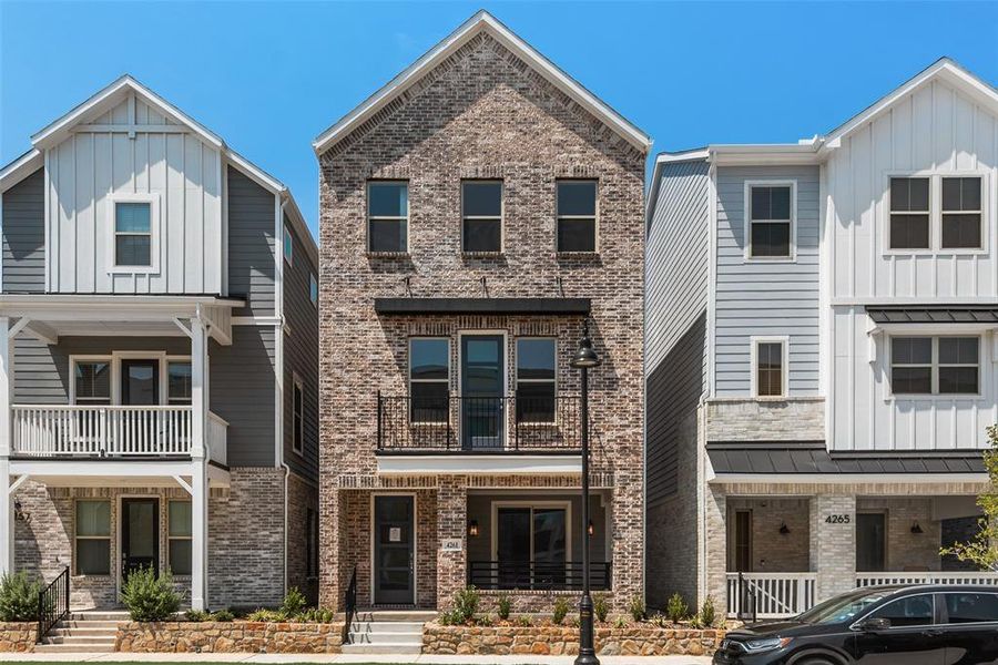 Front exterior of a new home in City Point, North Richland Hills, TX, highlighting curb appeal (Image 1).