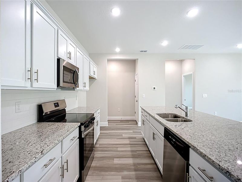 Furnished interior view inside a new home in , North Port (Image 8).