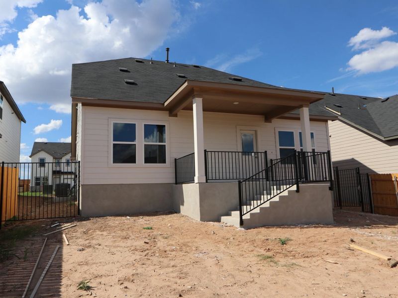 Exterior details and patio area of a home in Cascades at Onion Creek, Austin (Image 3).