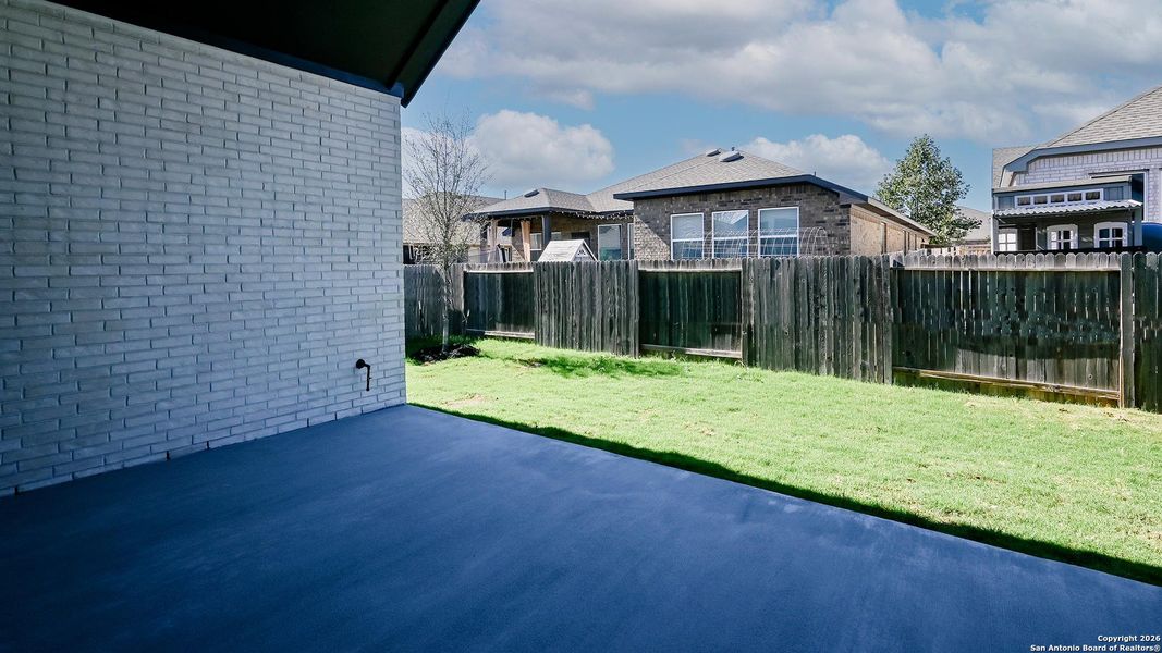 Exterior details and patio area of a home in Veramendi 60', New Braunfels (Image 21).
