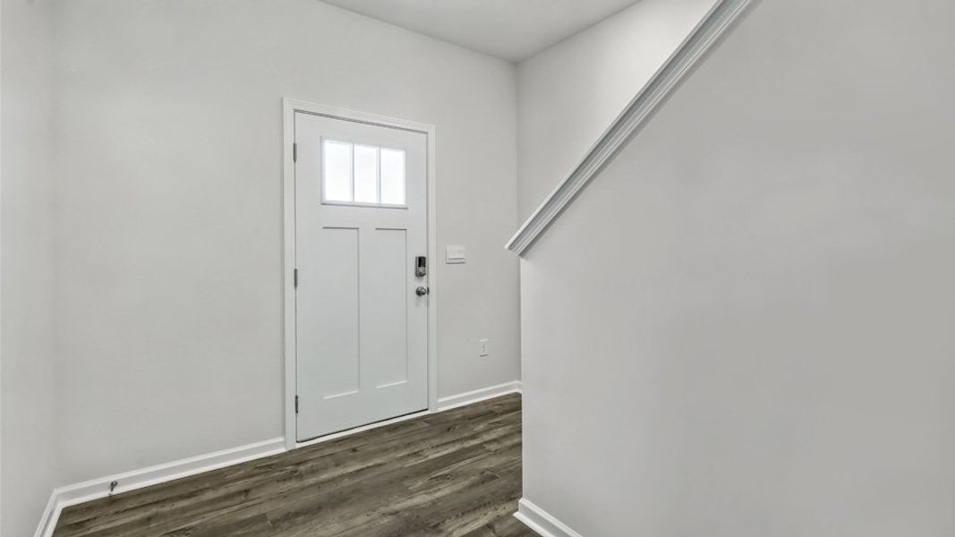 Representative unfurnished interior of a home built from the Robie by D.R. Horton in The Grove at Matthews Landing, Fuquay Varina (Image 13).