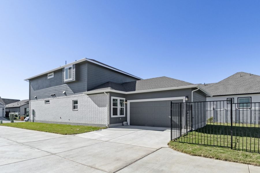 Front exterior of a new home in Easton Park, Austin, TX, highlighting curb appeal (Image 31).