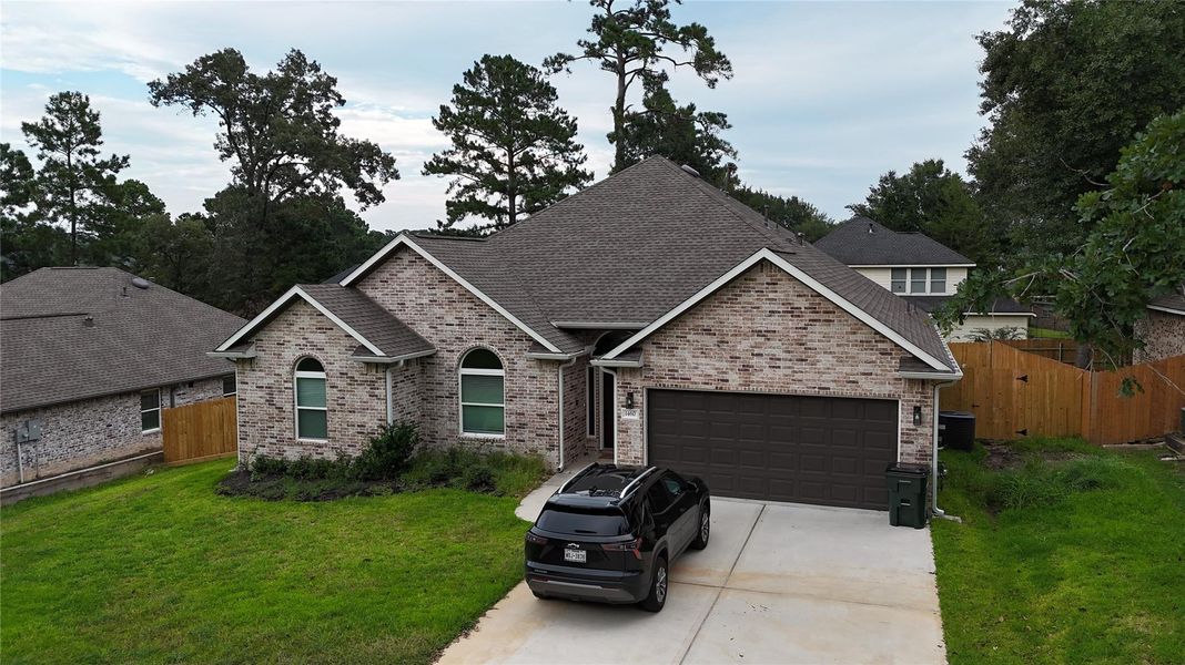 Front exterior of a new home in , Huntsville, TX, highlighting curb appeal (Image 2). Front exterior of a new home in , Huntsville, TX, highlighting curb appeal (Image 2).