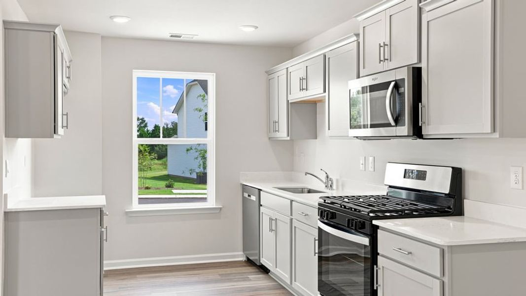 Furnished interior view inside a new home in Village 3, Woodruff (Image 7).