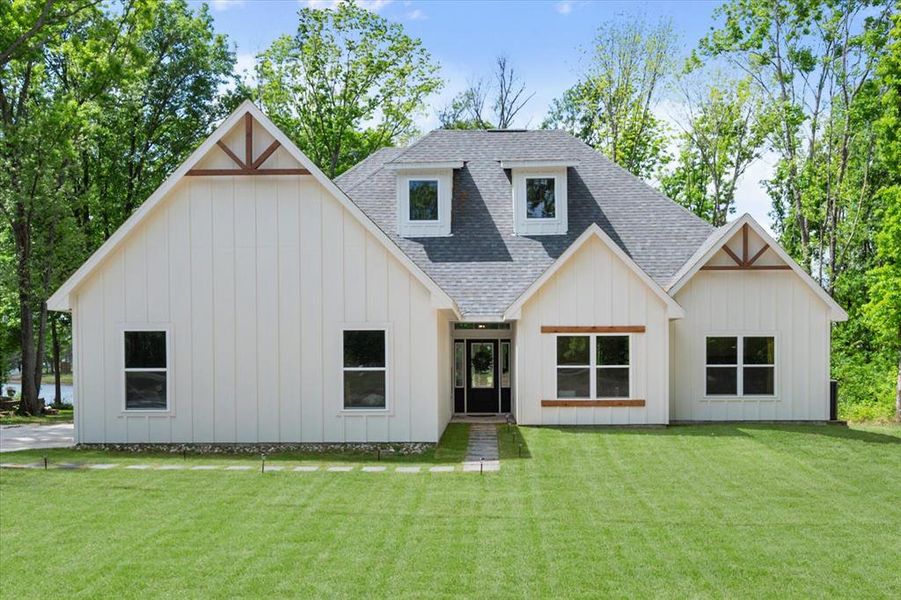 Front exterior of a new home in , Corsicana, TX, highlighting curb appeal (Image 2). Front exterior of a new home in , Corsicana, TX, highlighting curb appeal (Image 2).