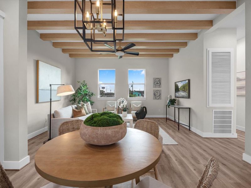 Take in this alternate view of the spacious living area, showcasing its perfectconnectivity to the kitchen and dining area. The open layout ensures effortless flow, making it ideal forboth intimate gatherings and larger entertainment. Take in this alternate view of the spacious living area, showcasing its perfectconnectivity to the kitchen and dining area. The open layout ensures effortless flow, making it ideal forboth intimate gatherings and larger entertainment.