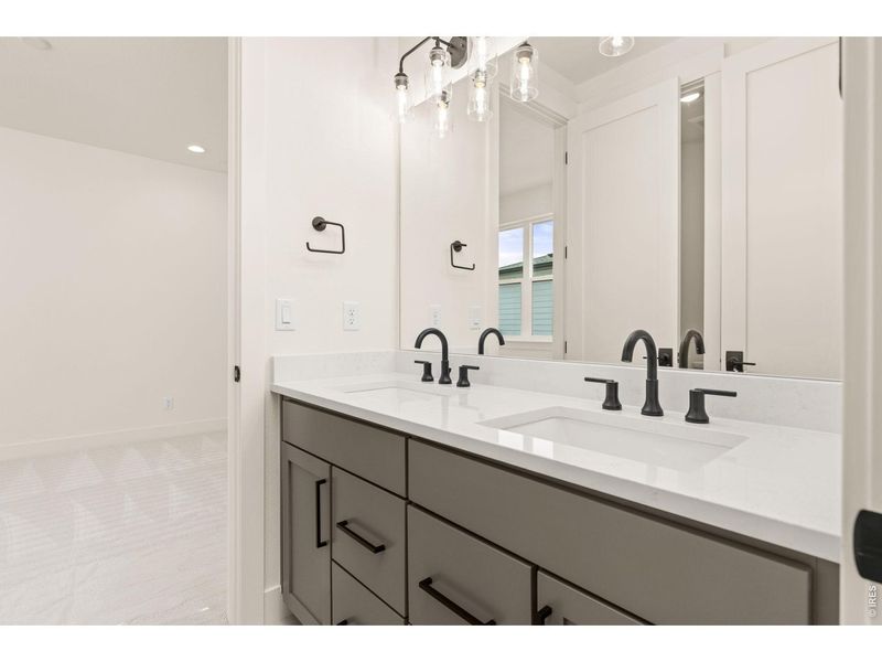 Furnished interior view inside a new home in RainDance, Windsor (Image 13).