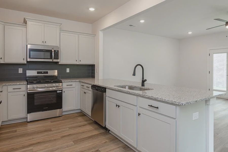 Representative furnished interior of a home built from the 1808 Townhome by Adams Homes in Parkstone Place Townhomes, Roebuck (Image 5). Representative furnished interior of a home built from the 1808 Townhome by Adams Homes in Parkstone Place Townhomes, Roebuck (Image 5).